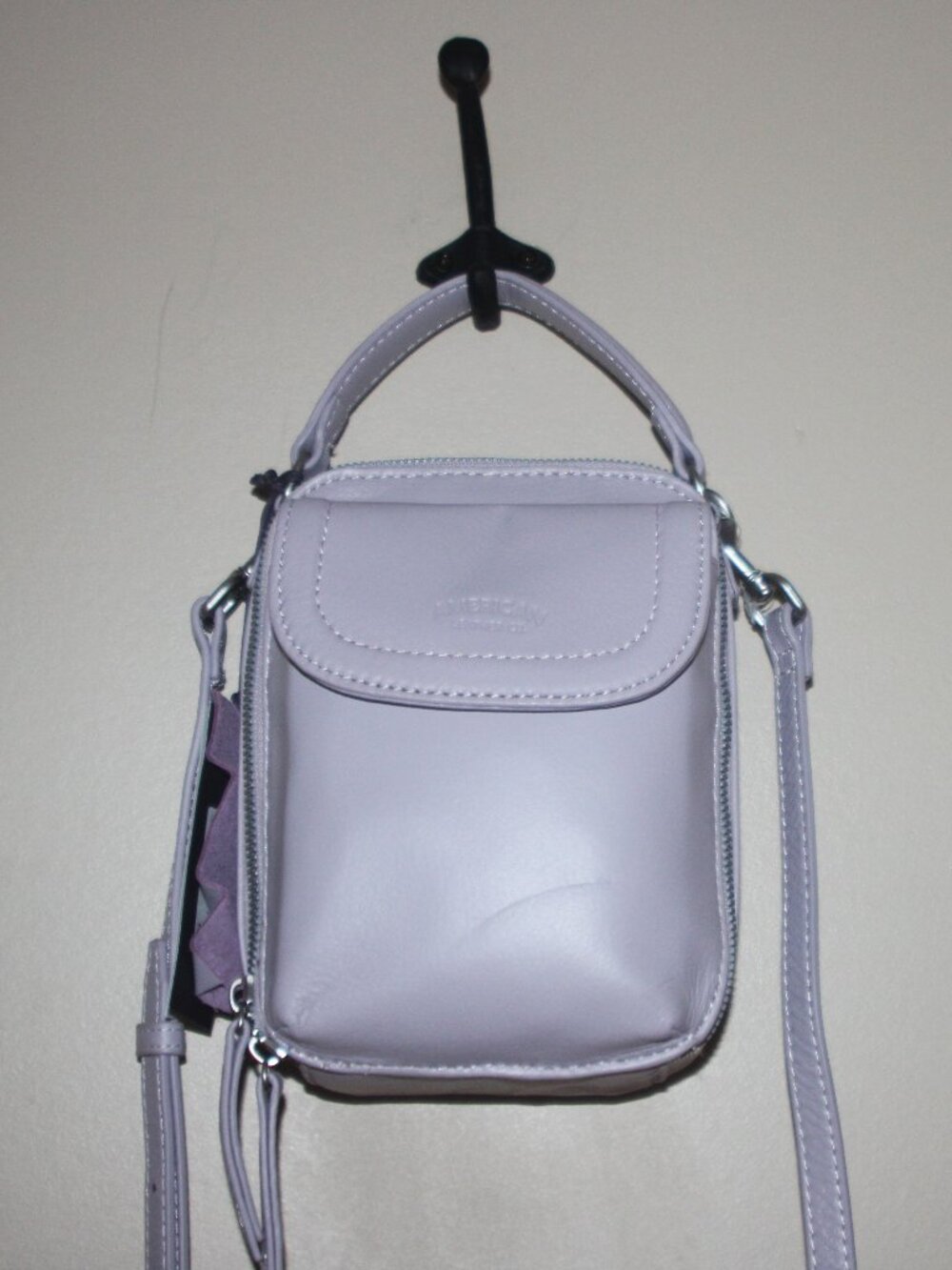 off    NWT AMERICAN LEATHER CROSSBODY BAG - LAVENDER